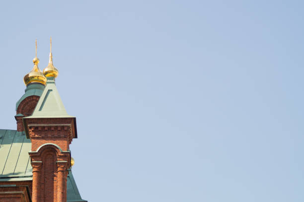 istock Beautiful old church tower with the cross 1163869589