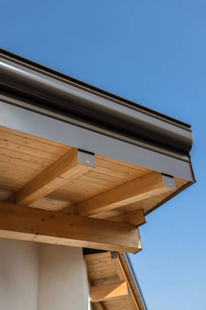 istock Rain gutter on the roof ecological house 1163872299