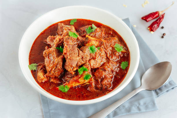 istock Lamb Curry with Colored Rice High Angle Photo. 1163872781