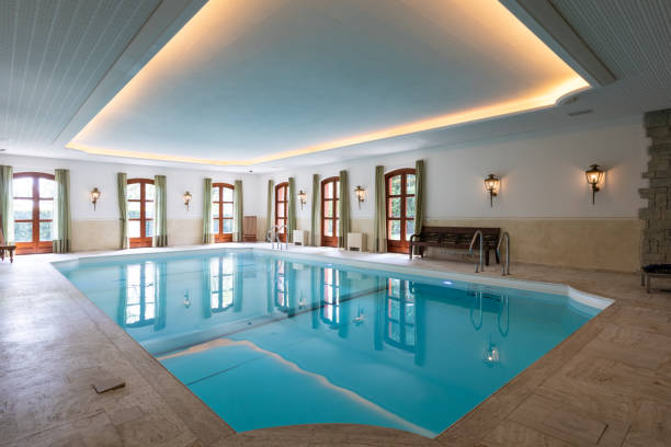 istock Indoor swimming pool in a private luxury villa 1163873686