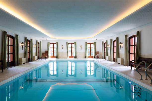 istock Indoor swimming pool in a private luxury villa 1163873744