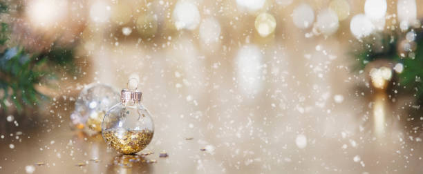 istock Christmas decoration on abstract gold background, close up 1163878697