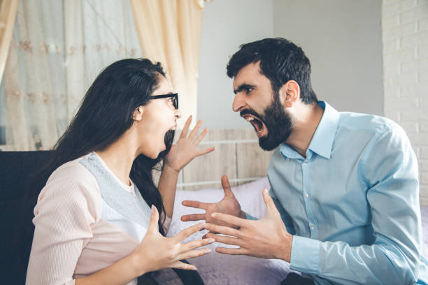 istock angry woman with man in home 1163887353