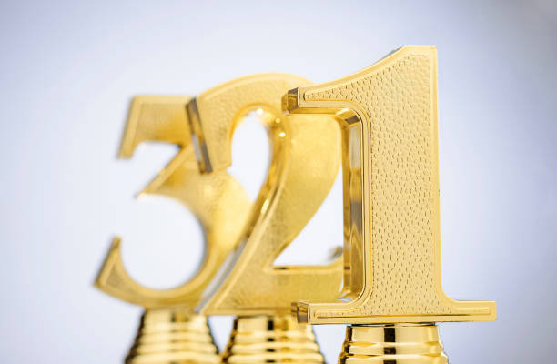 istock Gold trophies for the 1st, 2nd and 3rd places 1163887566