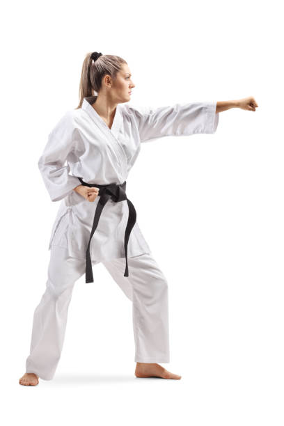 istock Young woman in kimono practicing martial arts 1163888195
