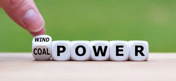 Photo of Hand flips a dice and changes the expression 