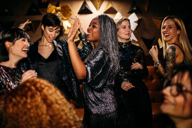 istock Happy young People Dancing In The Night Club 1163894842