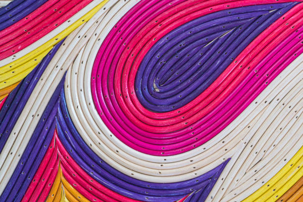 Colorful painted bamboo or rattan for background.