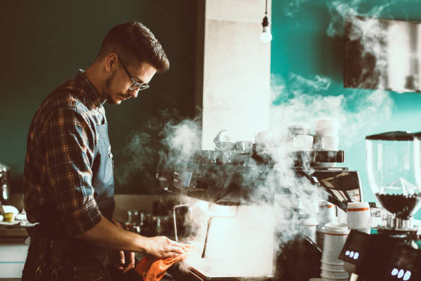 istock Young barista preparing espresso coffee 1163895927