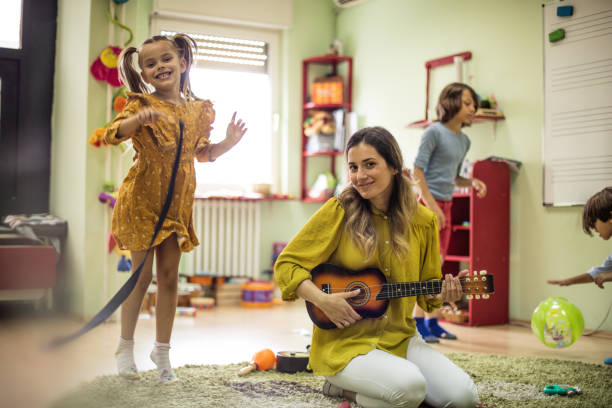istock The guitar releases wonderful sounds for the dance. 1163896894