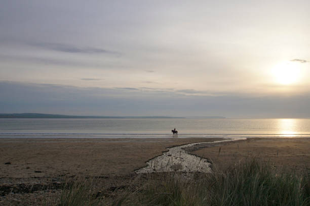 View over Dunnet Beach at sunset in the Scottish highlands. stock photo