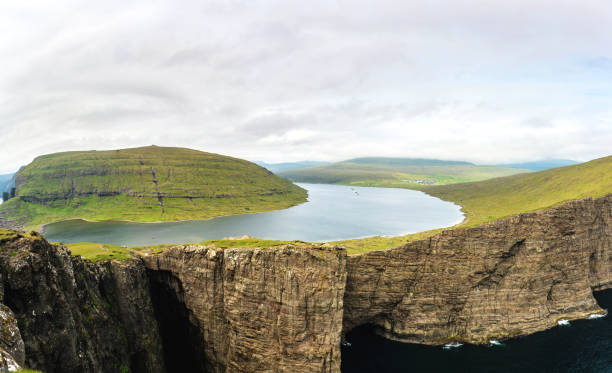 istock Leitisvatn lake panoramic picture. Vagar, Faroe Islands. 1163899916