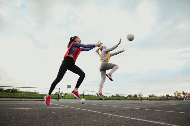 istock Friends Playing A Game Of Netball 1163901078