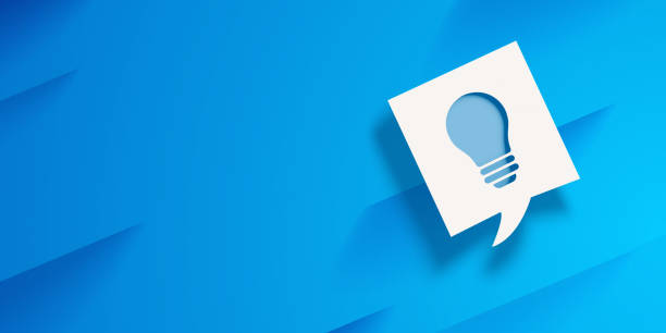 istock Light Bulb Symbol in White Speech Bubble on Blue Abstract Background 1163902557