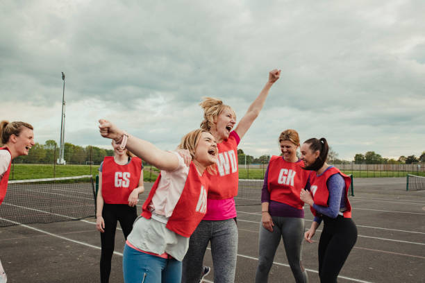 istock Netball Team Friends Celebrating A Win! 1163902938