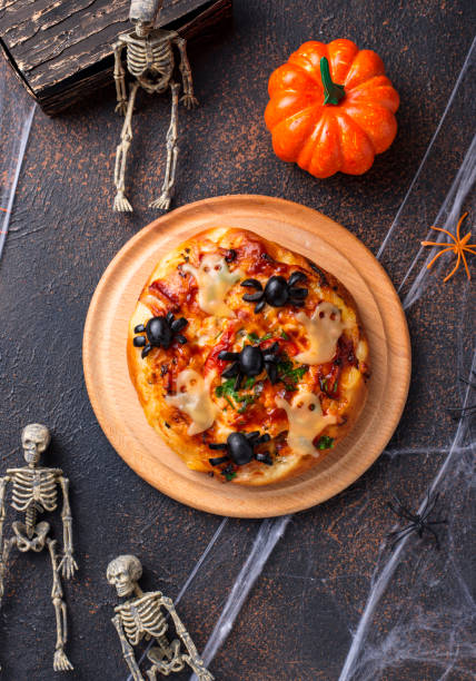 istock Halloween scary pizza decorated ghosts 1163902956