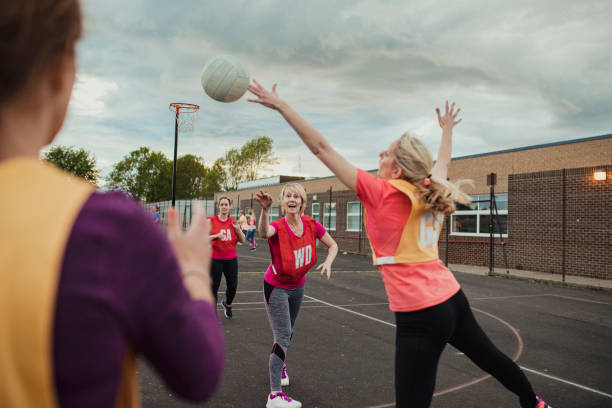 istock Female Netball Team Enjoying The Game! 1163903090