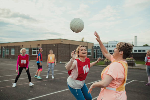 istock Women Playing A Game Of Netball 1163903108
