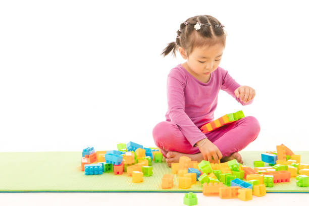 istock Little girl playing 1163904476