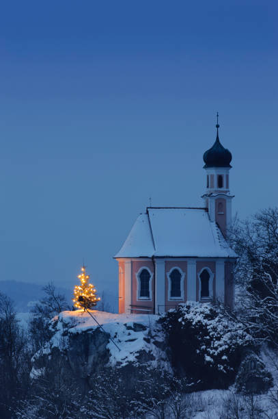 istock romantic Christmas chapel in Bavaria, Germany 1163904719
