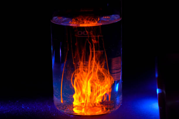 Chemical experiments with chemicals, flasks and mixing chemicals.
