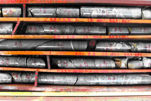 Core samples stored in a box. Geological exploration studies.