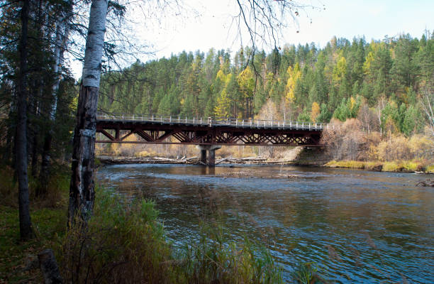istock River view with railway bridge in autumn 1163907309