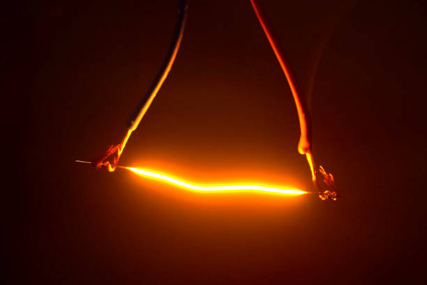 istock Niobium wire glows when electricity is passed through 1163908918