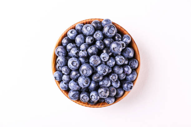 istock Organic blueberry berries in pile. 1163909110