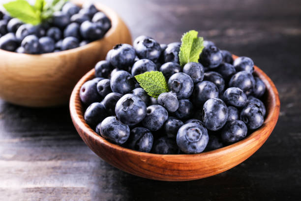 istock Organic blueberry berries in pile. 1163909304