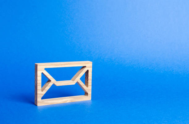 istock Wooden Envelope. mail address. Internet technologies and contacts. Communication over the network. Providing links and contacts on various public platforms and sites. Business promotion and feedback. 1163909944