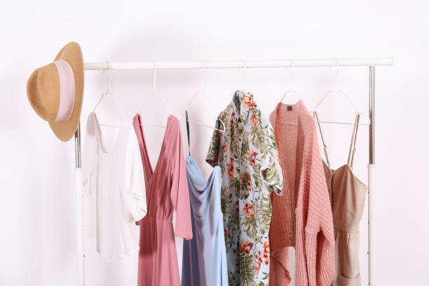 istock Different colorful casual clothing hanging in row. 1163913769