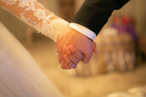 Bride and groom's hand