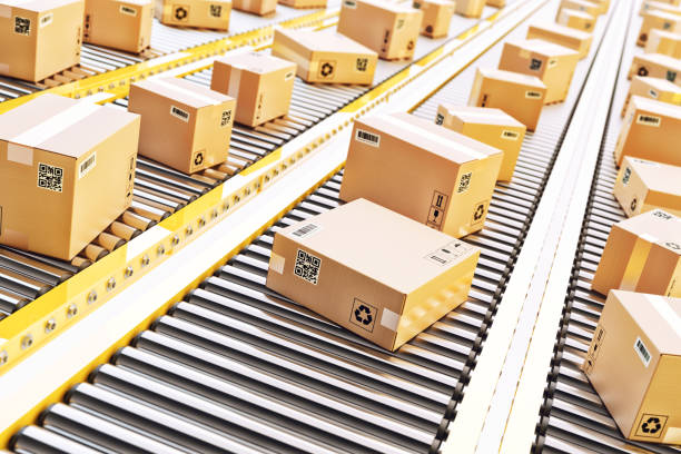 Packages delivery, packaging service and parcels transportation system concept Cardboard boxes on a conveyor line in distribution warehouse post structure photos stock pictures, royalty-free photos & images