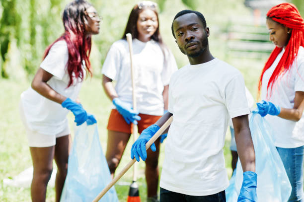 istock Group of happy african volunteers 1163916985