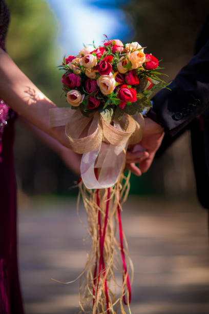 istock Bride and Groom Bouquet 1163916997