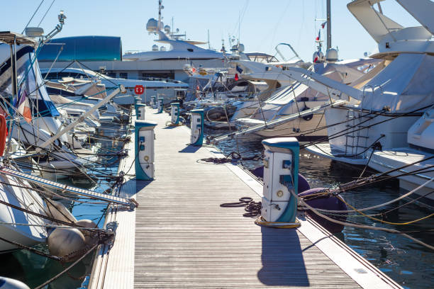 istock Moored yachts charging with fuel and electricity 1163917082