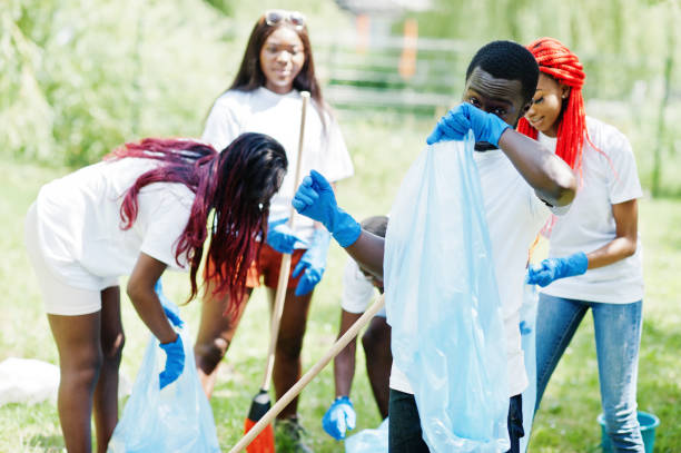 istock Group of happy african volunteers 1163917108