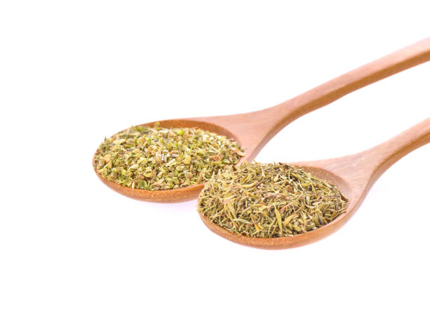 istock Dried oregano and thyme leaf on white background 1163917884