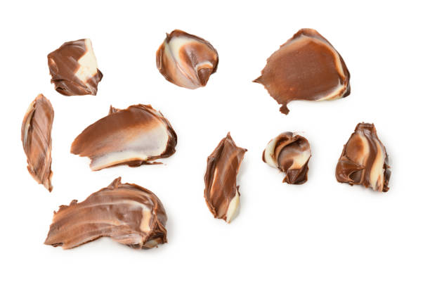 istock Chocolate cream splash isolated on white background. 1163918468