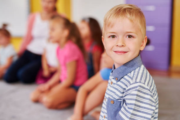 istock Smiling boy in the preschool 1163918693