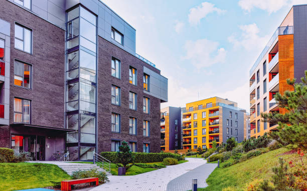 istock EU Modern residential apartment house building complex outdoor facilities bench 1163919476