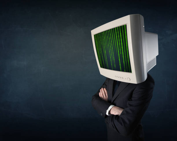 istock Cyber human with a monitor screen and computer code on the display 1163920332