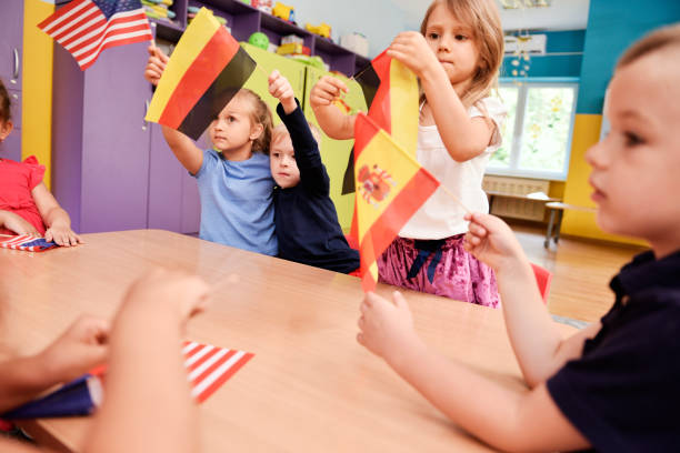 istock Group of kids learning languages in the preschool 1163920966