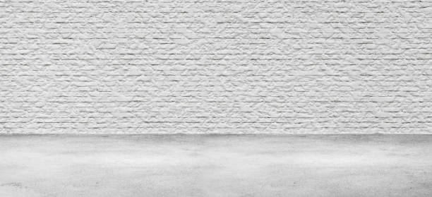 istock Room interior with brick wall and concrete floor 1163921345