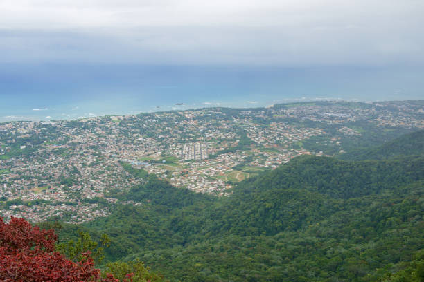 View from the top of Pico Isabel de Torres to the city and ocean in Puerto Plata, Dominican Republic. Puerto Plata, Dominican Republic - November 04, 2012: View from the top of Pico Isabel de Torres to the city and ocean in Puerto Plata, Dominican Republic. puerto plata stock pictures, royalty-free photos & images
