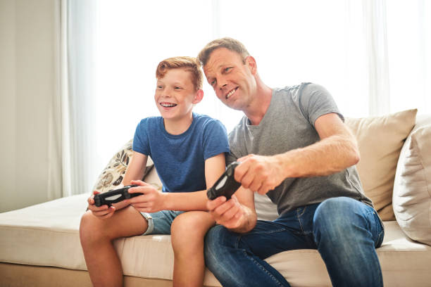 istock He's always trying to beat my high score 1163922276