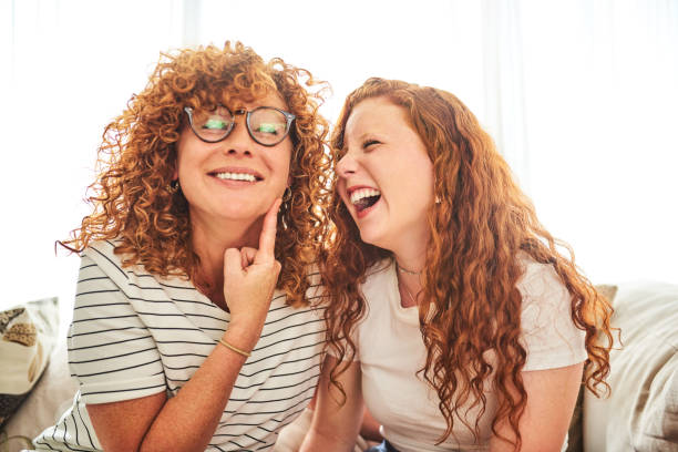 Come give me a kiss Shot of a happy mother and daughter spending some quality time together at home israel photos stock pictures, royalty-free photos & images