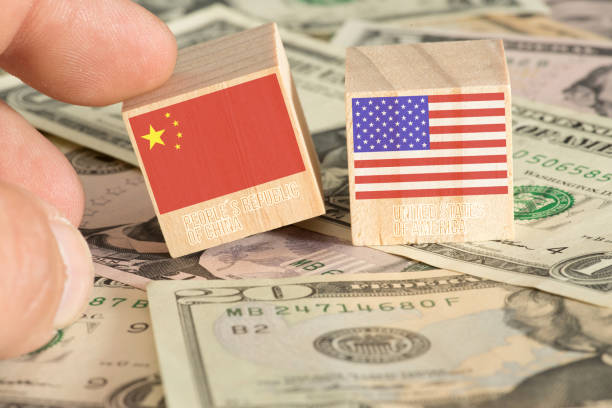 istock Dollar banknotes and China and America 1163922862