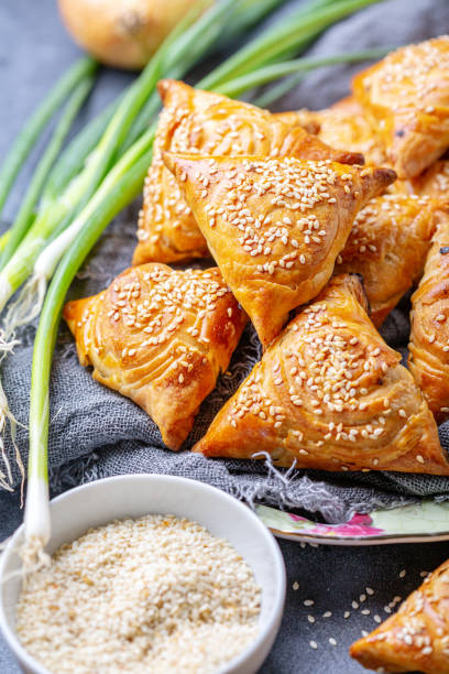 istock Homemade samosas sprinkled with sesame seeds. 1163924704